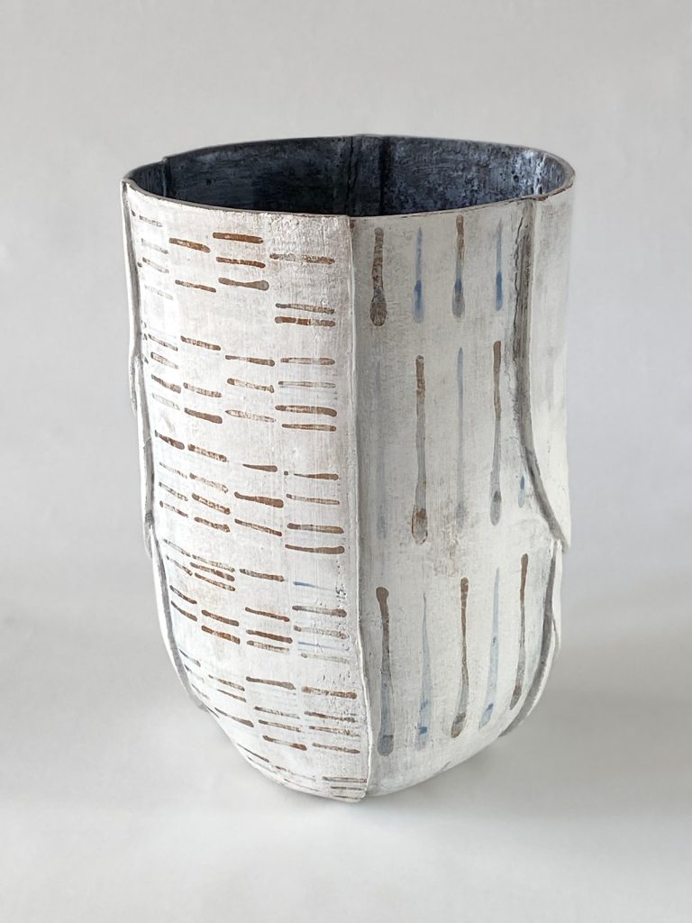 Slab-built stoneware  volume with brown and light blue lines  on a white background by Alexandra Ridel