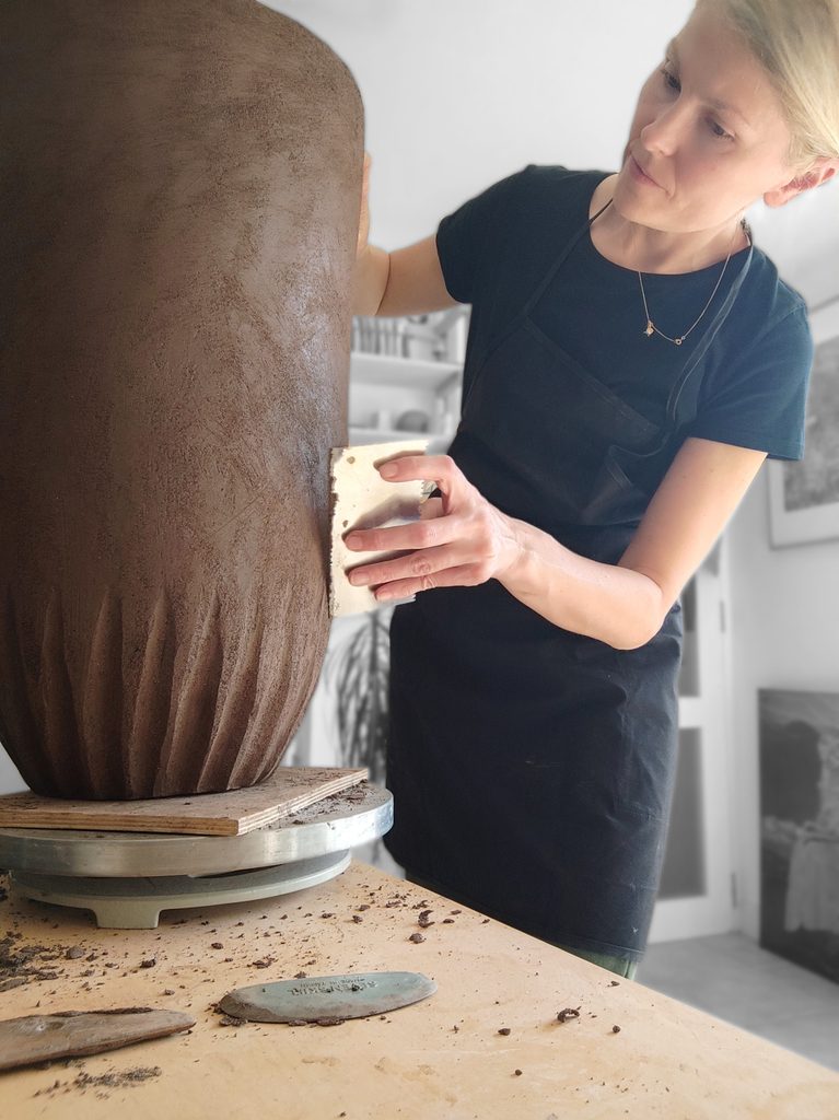 Alexandra Ridel working in her ceramic studio