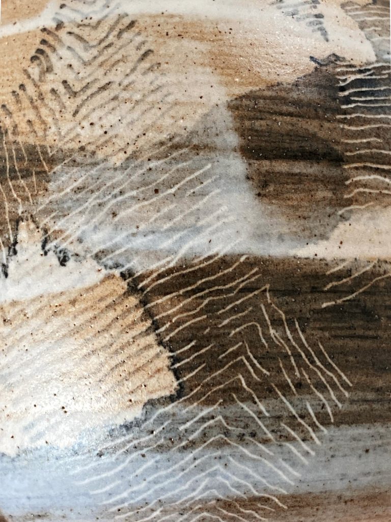 Detail of a graphic motif on a stoneware vessel, by Alexandra Ridel