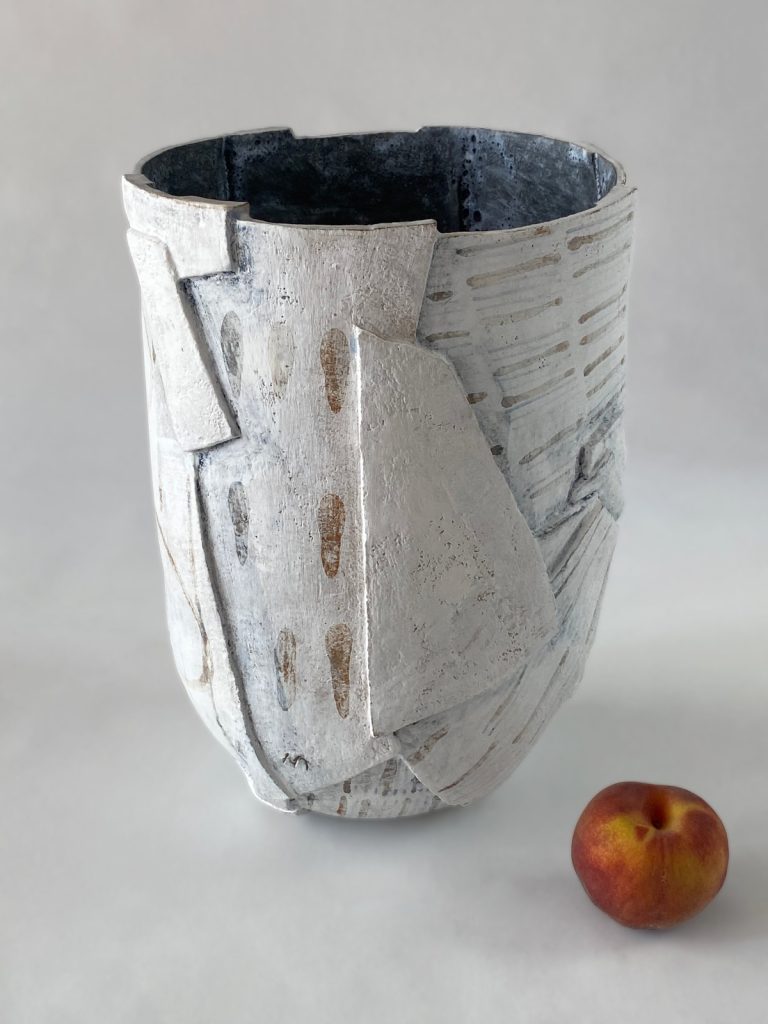 slab-built stoneware volume with graphic drops and lines patterns on a white background by Alexandra Ridel