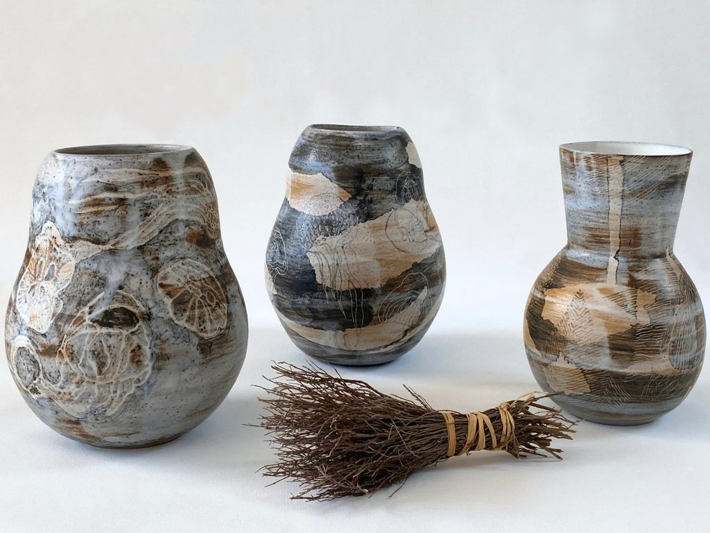 Collection of stoneware vessels with graphic decoration, by Alexandra Ridel